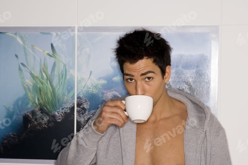 Preview: Man Drinking Coffee With Shirt Open
