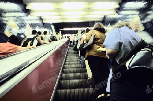 Preview: Crowds Of Commuters On Busy Escalators