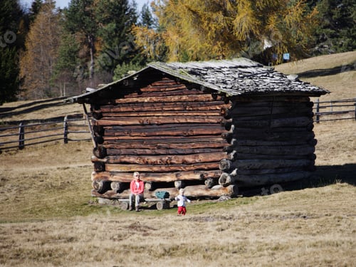 Preview: Mother And Daughter Next To Chalet, Luesener Alm, Dolomite Alps, South Tyrol, Italy