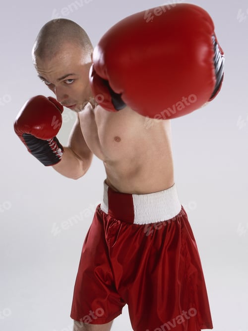Preview: Male Boxer Throwing A Punch, Facing The Camera
