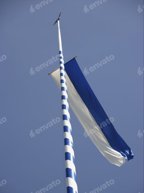 Preview: Low Angle View Of Maypole With Flag, Bavaria, Germany