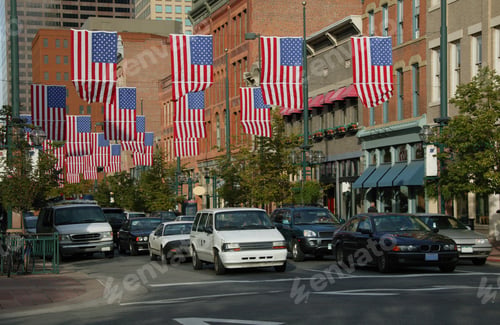 Preview: View Of American Flags Hanging Between Buildings In Larimer Street, Denver, Colorado, Usa