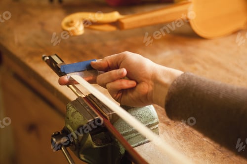 Preview: Close-Up Of Violin Maker Combing Horsehair For A Bow