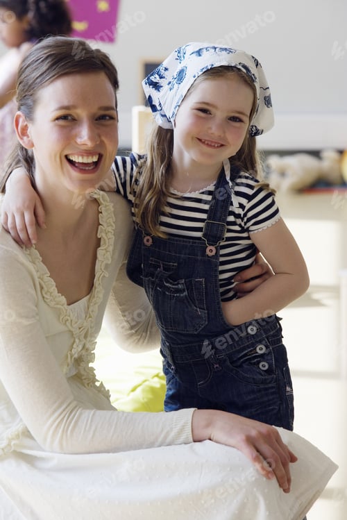 Preview: Preschool Teacher And Student Hugging