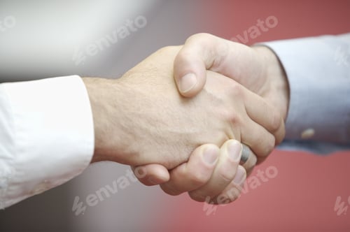 Preview: Close Up Of Businessmen Shaking Hands
