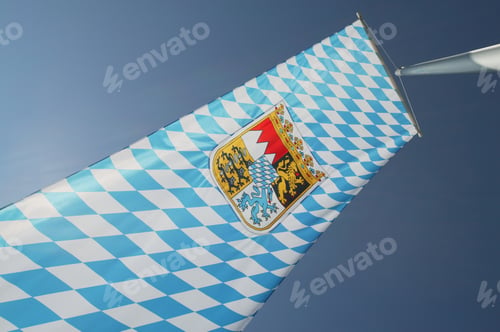 Preview: Low Angle View Of A Flag With Bavarian Crest Against Blue Sky, Bavaria, Germany