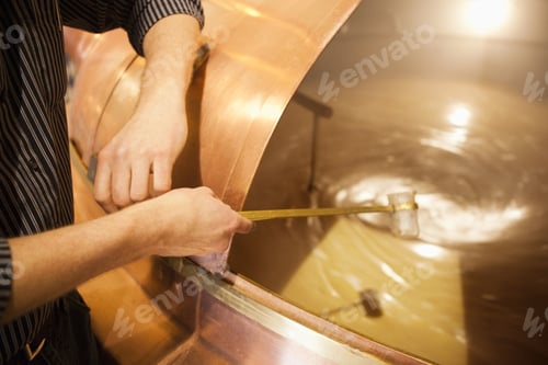 Preview: Brewer Taking Mash Sample At Brewery In Traunstein, Bavaria, Germany
