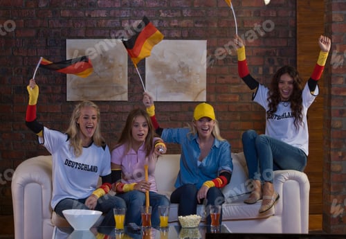 Preview: Young Women Cheering And Watching Tv
