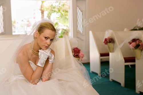 Preview: Bride Sitting In Church Pew