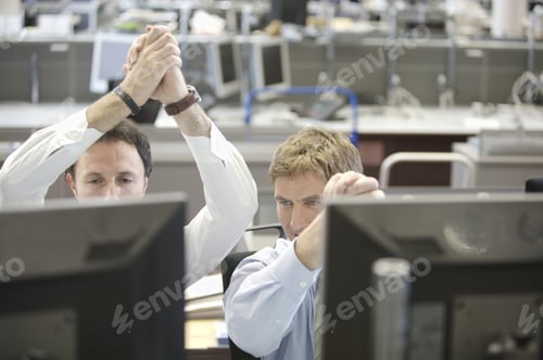 Preview: Two Businessmen Cheering At Desk