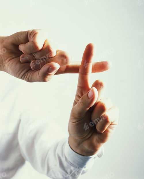 Preview: Executive Making A Cross With Fingers