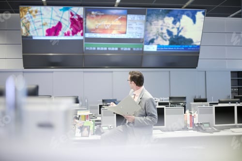 Preview: Businessman Looking Stock Market Screen