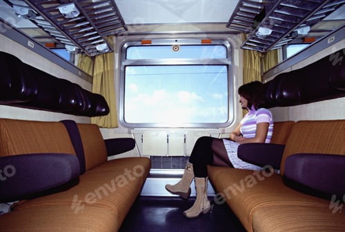 Preview: View Of A Woman Sitting In A Train Cabin
