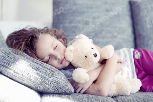 Preview: Young Girl Sleeping With Teddy Bear On Sofa