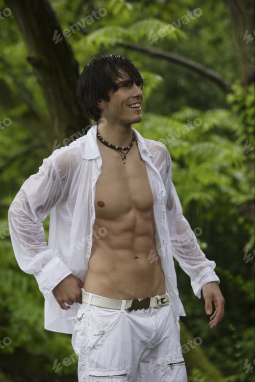 Preview: Man In Woods With Shirt Unbuttoned