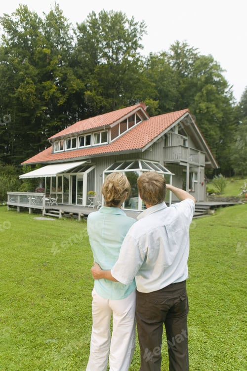 Preview: Young Couple Looking At House