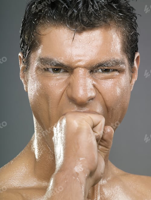 Preview: Close Up Of Man Biting Fist