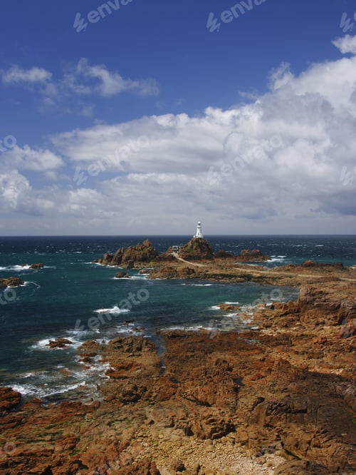 Preview: The Corbiere Lighthouse During Low Tide, In The South West Of Jersey, Channel Islands, Uk