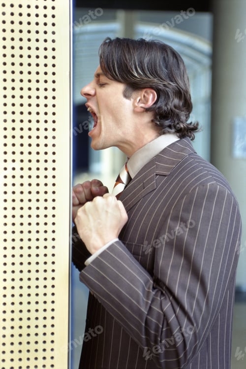 Preview: Portrait Of A Young Businessman Yelling