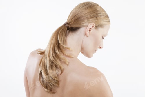 Preview: Woman with Long Hair Posed Against White Background