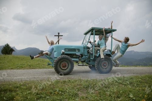 Preview: Friends Riding On Farm Vehicle, Kleinwalsertal, Allgau, Germany