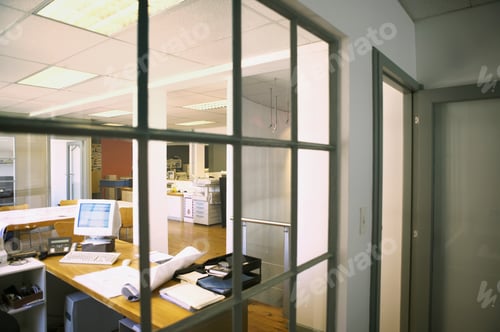 Preview: View Of An Empty Office Seen From Behind A Window