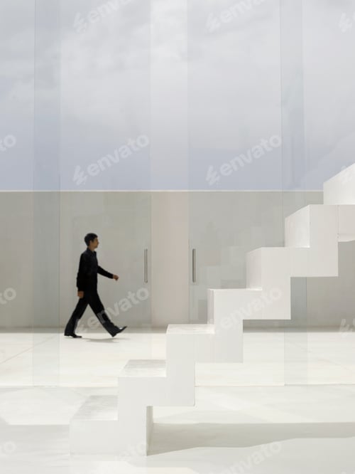 Preview: Man Walking Behind Glass Doors