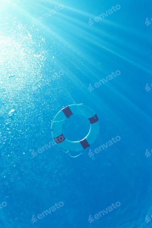 Preview: Underview, Life Preserver Floating On Surface Of Water
