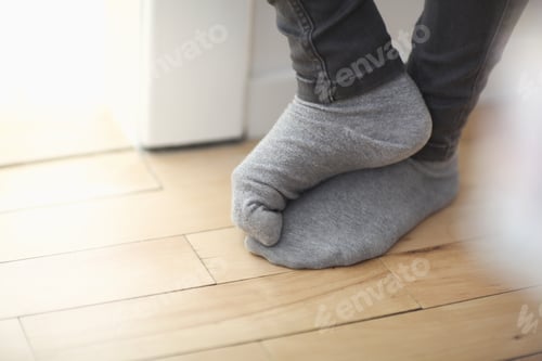 Preview: Low Section Of Teenager In Gray Socks