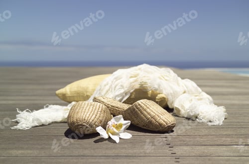 Preview: Pillow, Scarf And Slippers On Boardwalk