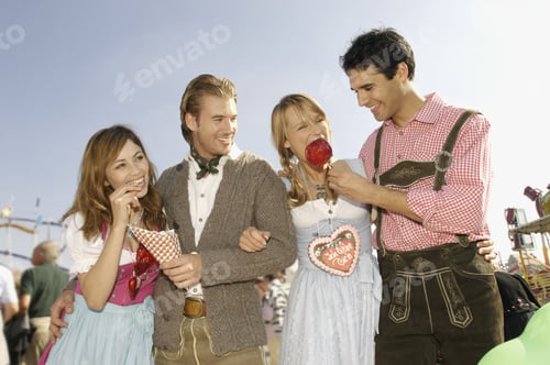 Preview: Couple Enjoying Food At Festival In Munich