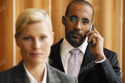 Preview: Portrait Of Two Young Businesspeople
