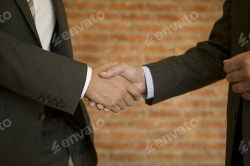 Preview: Detail Of Businessmen Shaking Hands
