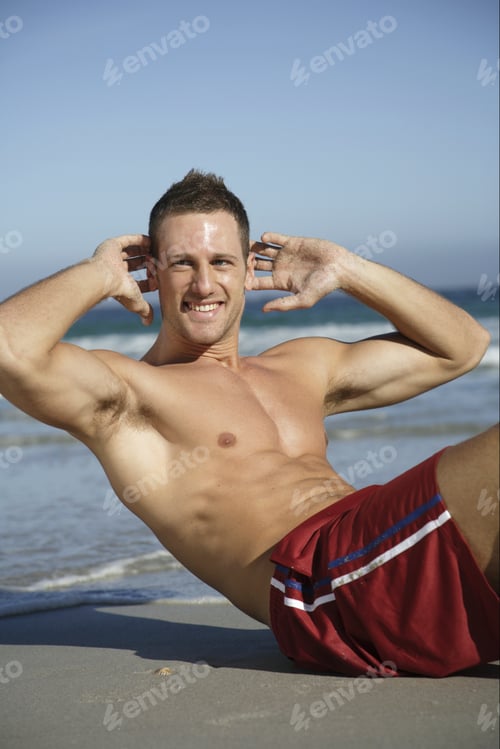 Preview: Man Doing Sit-Ups At Beach