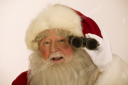 Preview: Studio Shot Of Santa Claus Holding Binoculars