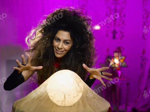 Preview: Female Fortune Teller With Illuminated Globe