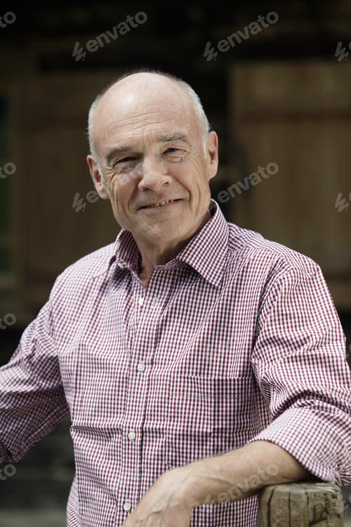 Preview: Senior Man Leaning On Post
