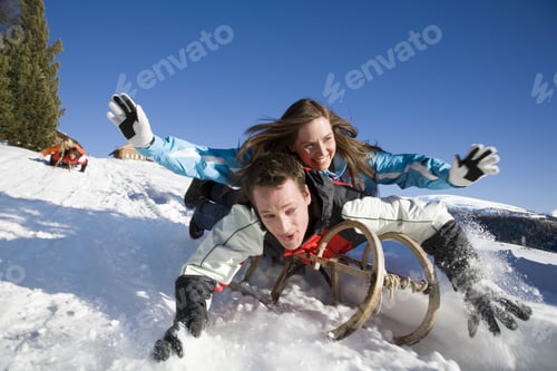 Preview: Couple Riding On Sled, Luesener Alm, Dolomite Alps, South Tyrol, Italy