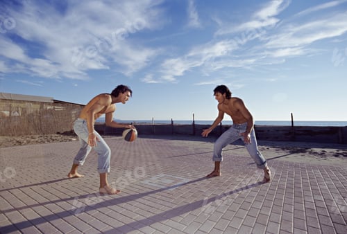 Preview: View Of Two Men Playing Basketball