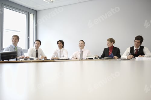 Preview: Group Of Businesspeople At Meeting