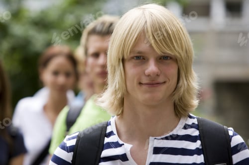 Preview: Male Teenage Student Smiling Outdoors