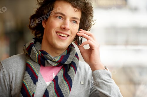 Preview: A Portrait Of A Man Holding A Mobile Phone, Smiling