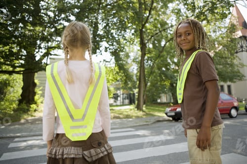Preview: Two School Children Next To Crosswalk Wearing Safety Vests