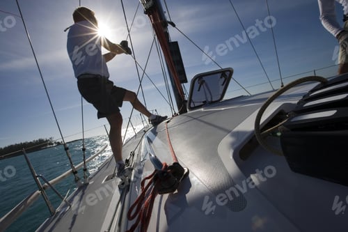 Preview: Rear View Of Mid Adult Man Sailing In Key West, Florida, Usa
