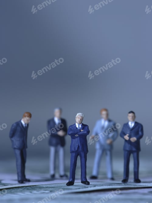 Preview: Figurines Of Businessmen Standing In Group