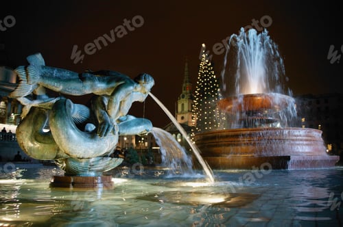 Preview: View Of A Fountain At Night During Christmas Season, Trafalgar Square, London, United Kingdom