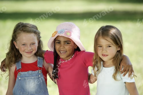 Preview: Three Young Girls Smiling Outdoors