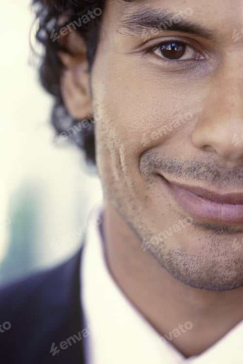 Preview: Close-Up Portrait Of Smiling Young Businessman