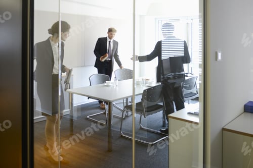 Preview: Business Colleagues In Conference Room