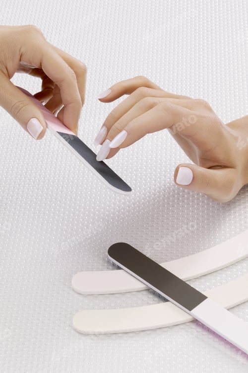 Preview: Close Up Of Woman’S Hand Receiving Manicure Treatment